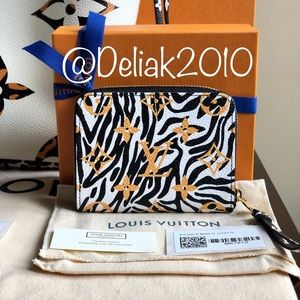 SOLD! NEW Louis Vuitton Jungle Zippy Coin Ivory